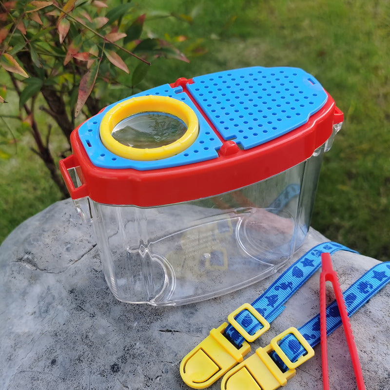 Unisex storage toy with magnifying glass Bowlift