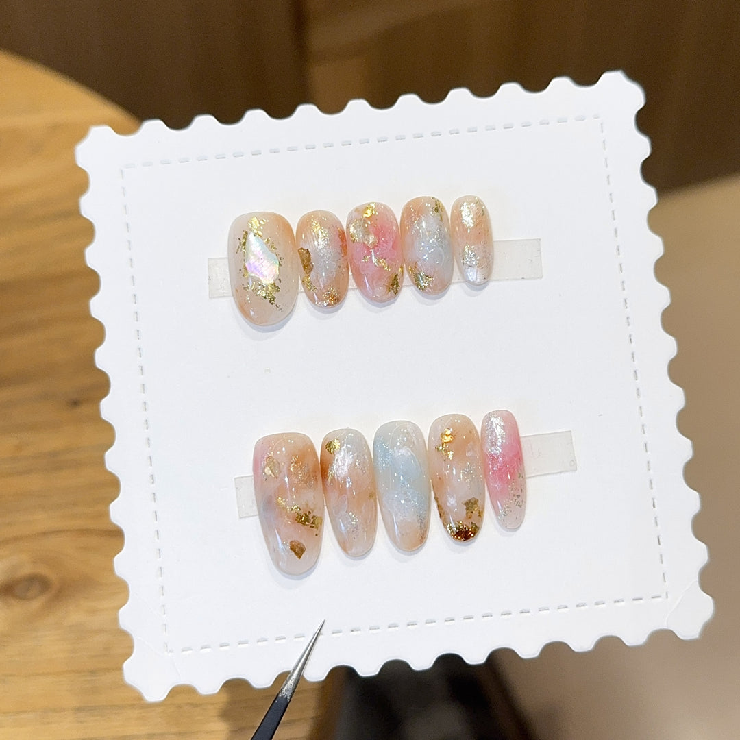 Artificial nails with glamorous metallic details and sparkling design Bowlift