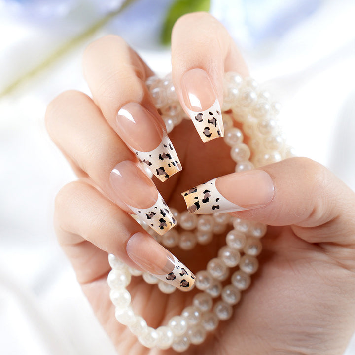 Stylish French Tip Press-On Nails with Animal Print Bowlift