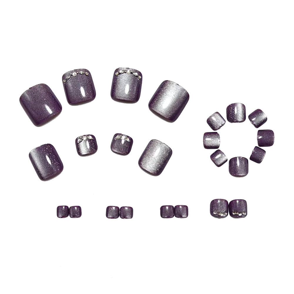 Shiny toenail art with rhinestone embellishment Bowlift
