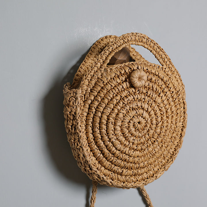 Handcrafted Round Wicker Bag with Elegant Closure Bowlift