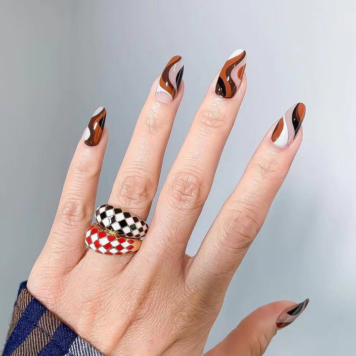 Artfully decorated nail extensions Bowlift