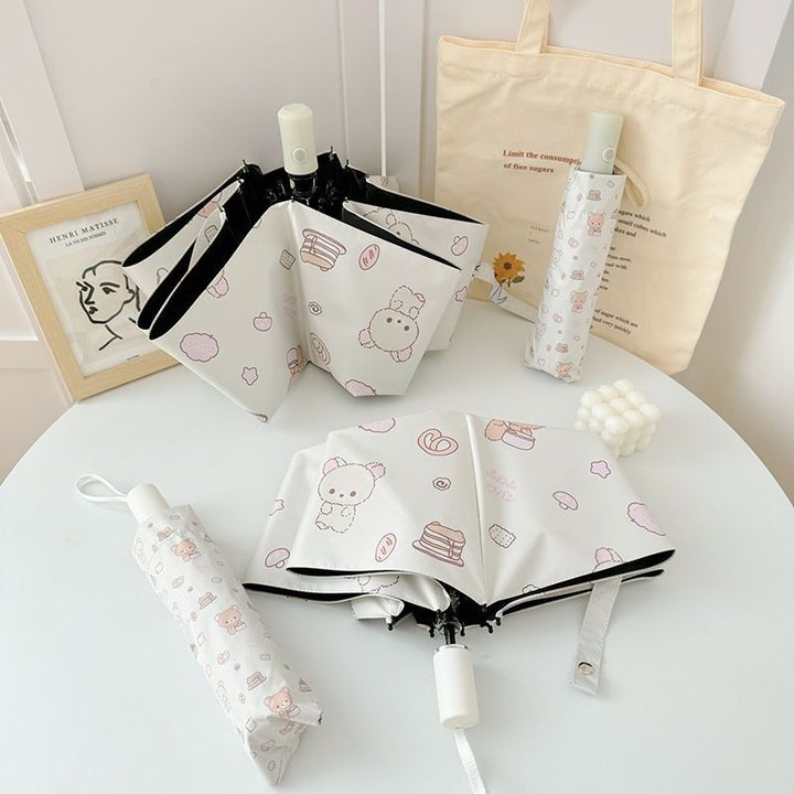 Women's foldable umbrella with playful animal motif Bowlift