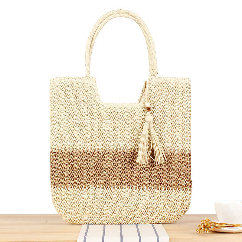 Elegant straw bag with practical tassels Bowlift