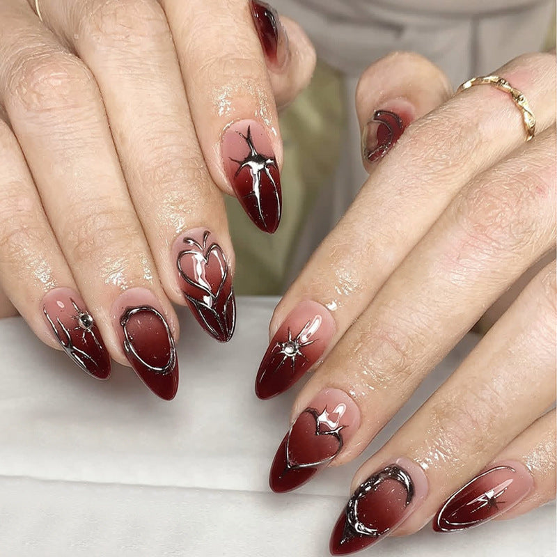 Artificial nail set with elegant glitter accents and floral details Bowlift
