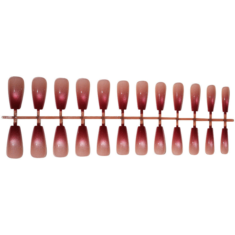 Acrylic nail set with glamorous gradient and glitter accents Bowlift