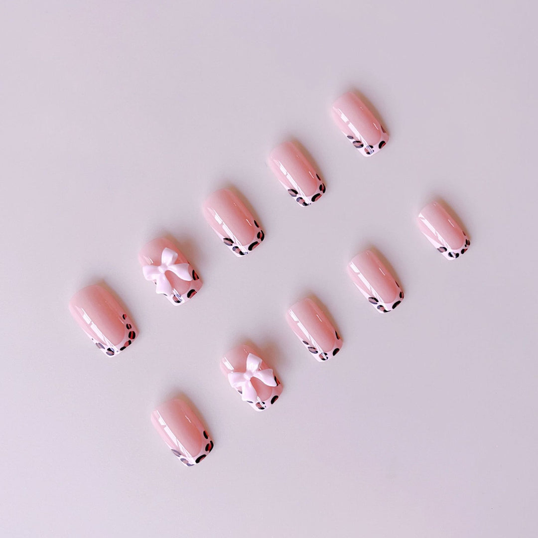 Artificial nail set with elegant leopard design and cute bows Bowlift