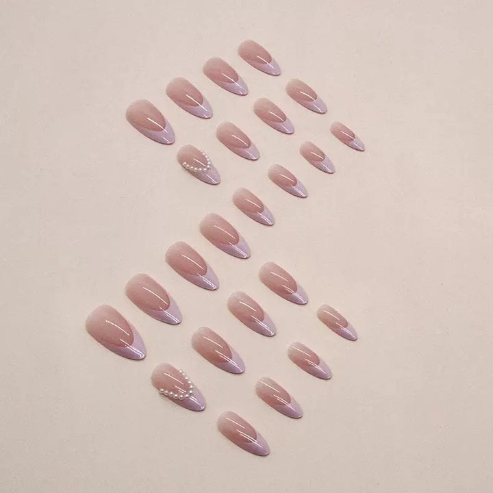 Elegant artificial nail tips with glitter and pearl decorations Bowlift