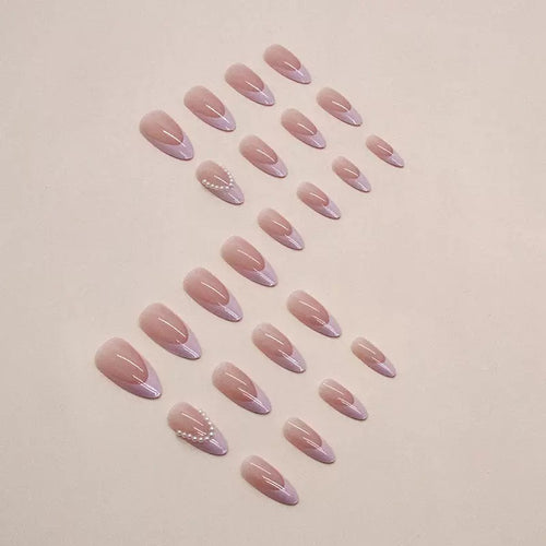 Elegant artificial nail tips with glitter and pearl decorations Bowlift