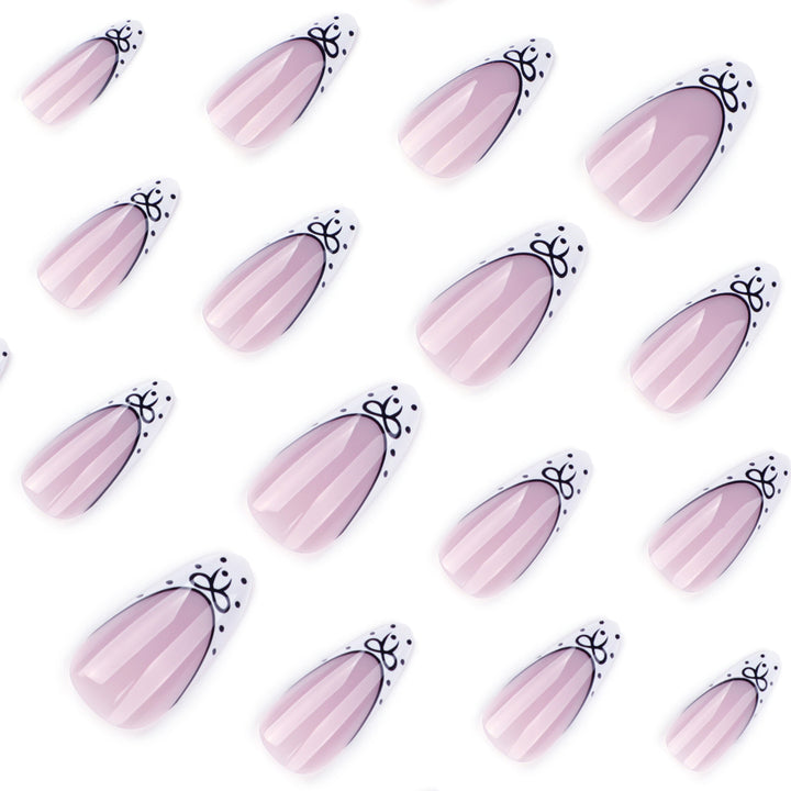 Artistic Stiletto Nails with Elegant Floral Design Bowlift