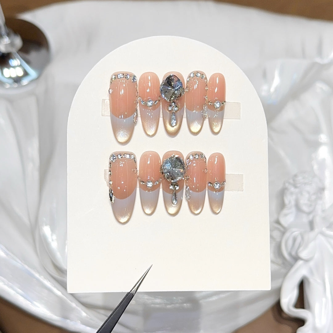Artificial nails with elegant rhinestone accents Bowlift