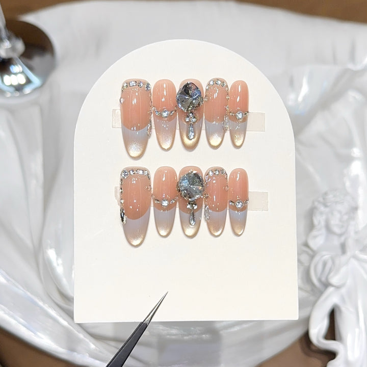 Artificial nails with elegant rhinestone accents Bowlift