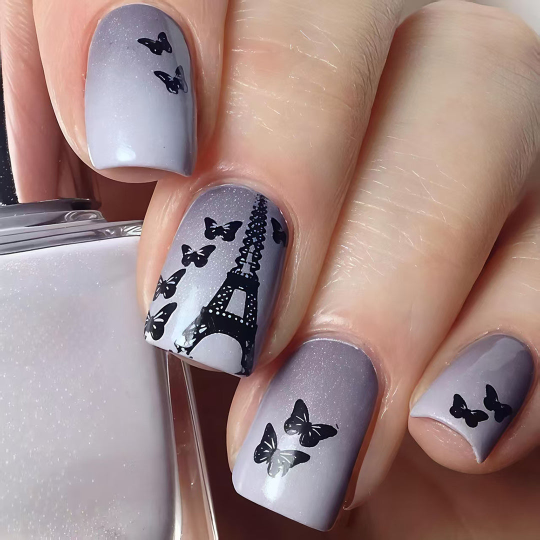 Artificial nails with Paris motif and butterflies Bowlift