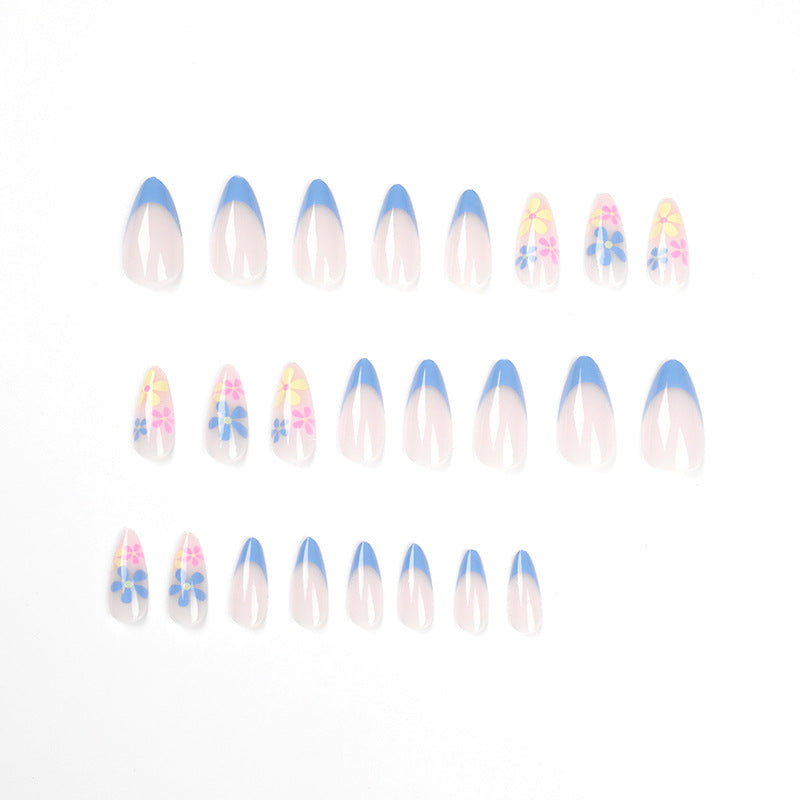 Artificial nail art with floral design and gradient Bowlift