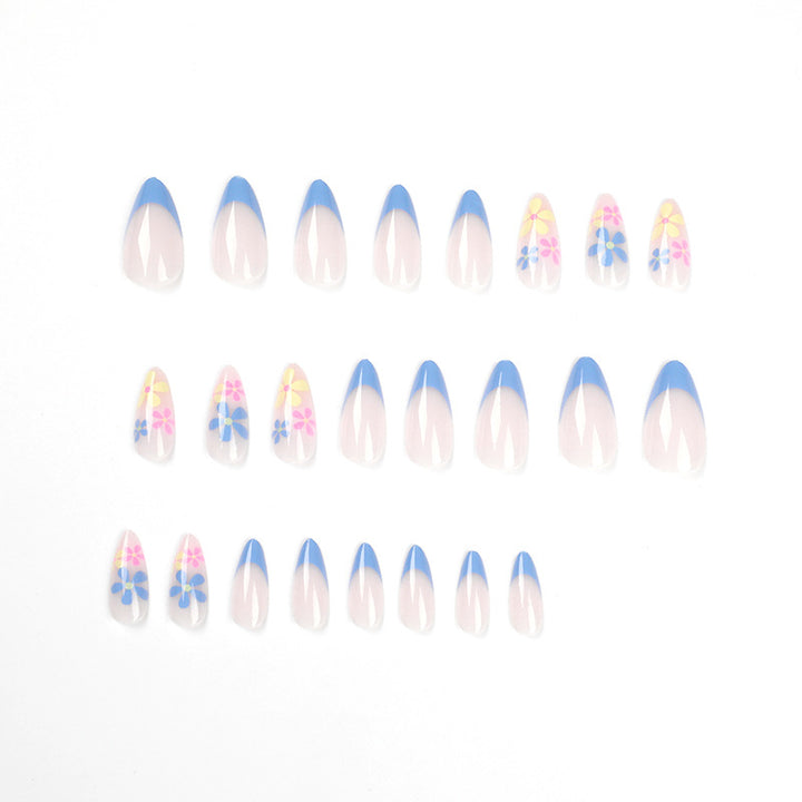 Artificial nail art with floral design and gradient Bowlift
