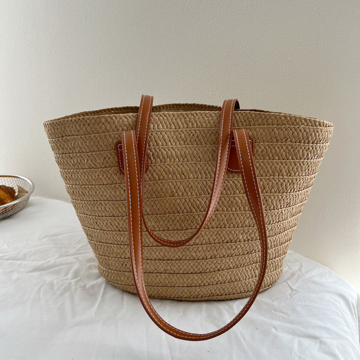 Handcrafted straw bag with elegant leather handles Bowlift