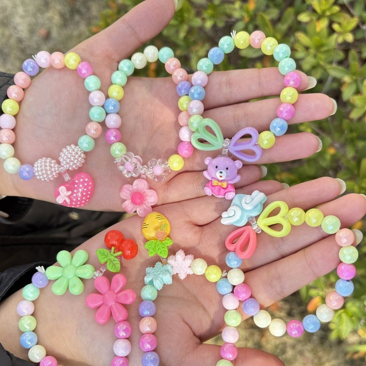 Colorful bracelet with flower charms Bowlift