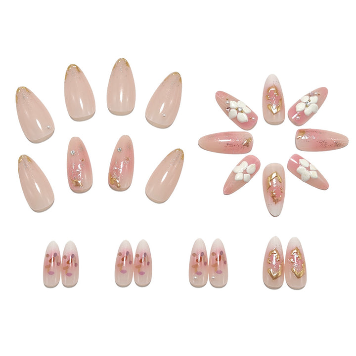 Artificial nails with delicate floral decorations and glitter effects Bowlift