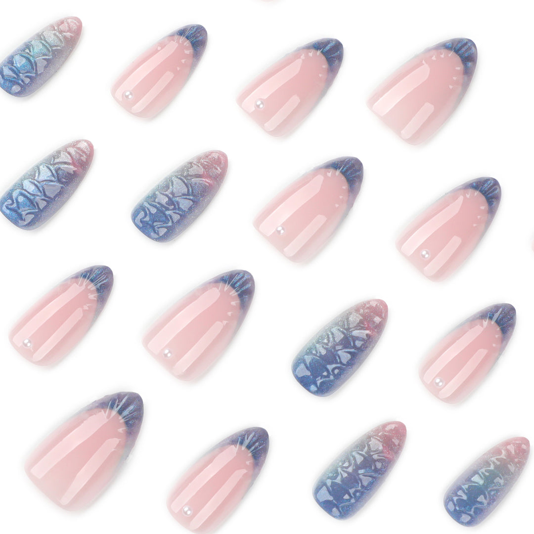 Artful nail extensions with shimmering play of colors and glamorous accents Bowlift