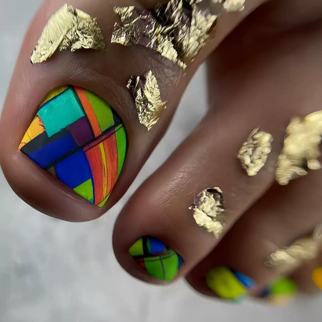 Creative toenail design with modern geometric patterns and golden accents Bowlift