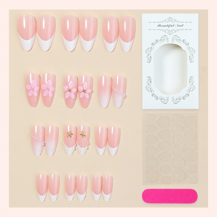 Artifical nail set with delicate flower and decorative elements Bowlift