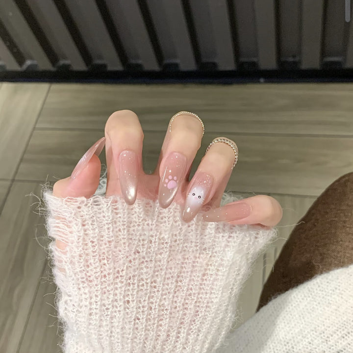 Artistic Press-On Nail Design with Decorative Silver Accents Bowlift