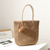 Handmade straw bag with pompom details Bowlift