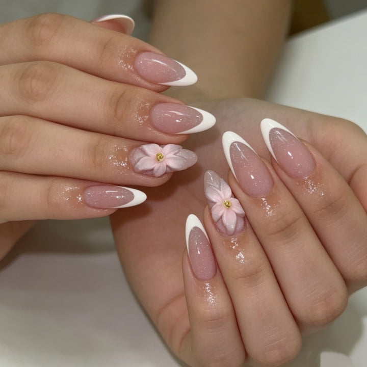 Artificial nails with floral decoration and elegant French tip design Bowlift