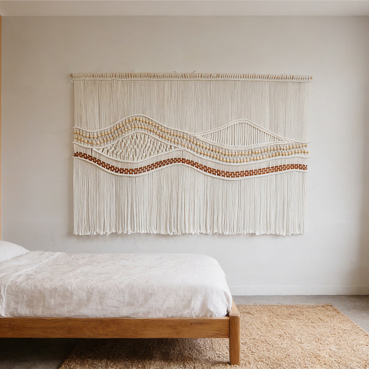 Artistic macramé wall hanging with elegant wave patterns