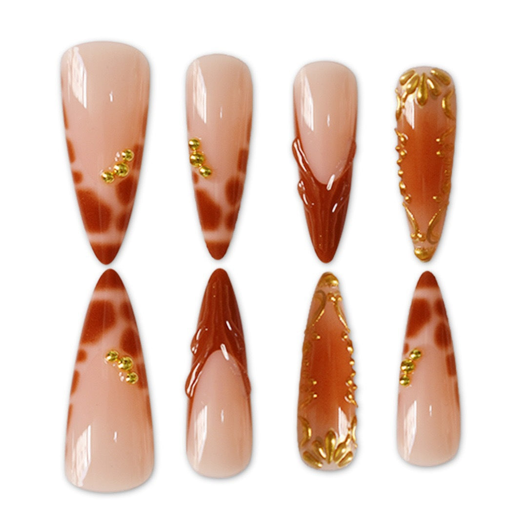 Elegant Stiletto Nail Art Enhancements with Artistic Details Bowlift