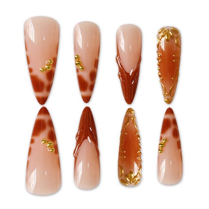 Elegant Stiletto Nail Art Enhancements with Artistic Details Bowlift