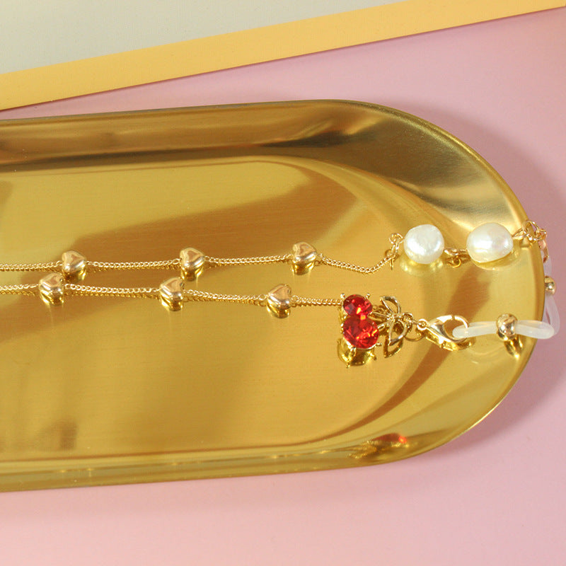 Elegant jewelry ribbon with pearls and silver accents Bowlift