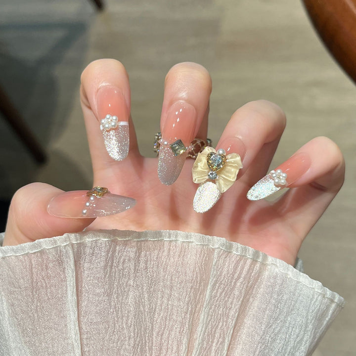 Elegant Nail Art Extensions with Pearl Accents Bowlift