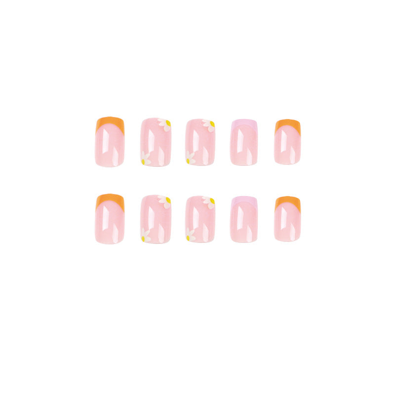 Artistic acrylic nails with floral design and creative color accents Bowlift