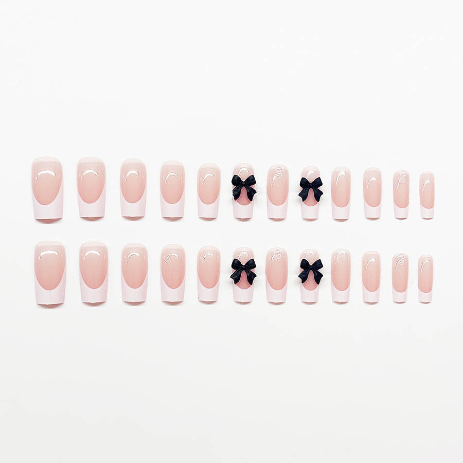 Acrylic nail set with stylish black and pearl details Bowlift