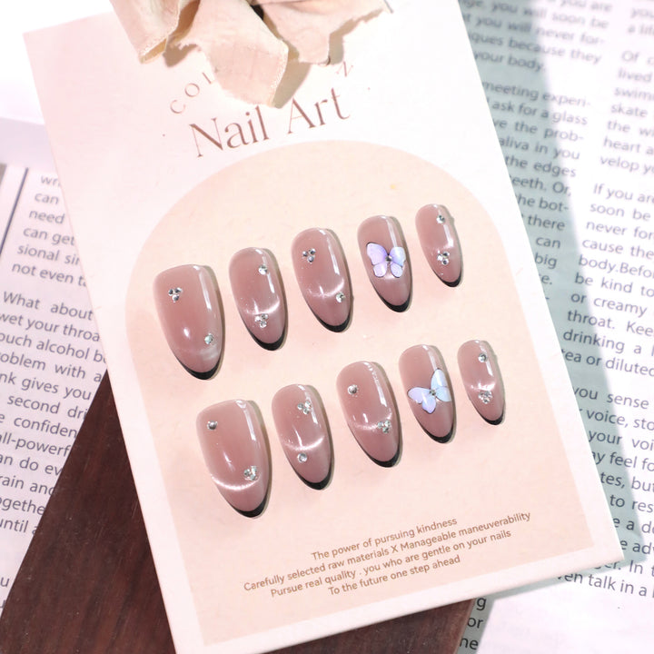 Artificial nail art with pearl and flower decorations Bowlift