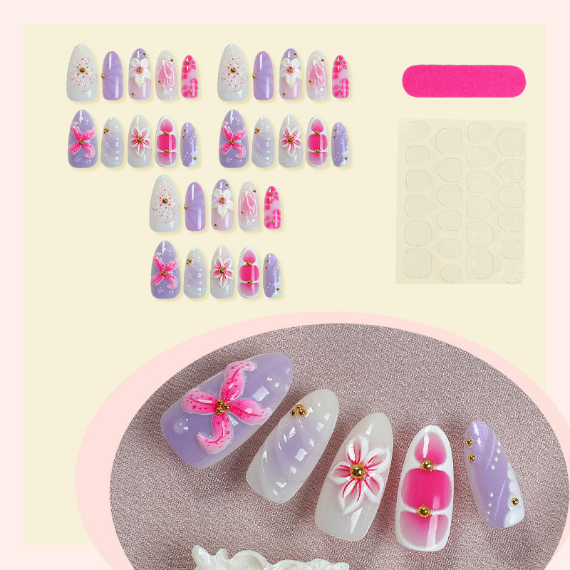 Artificial nail set with floral decorations and delicate glitter Bowlift