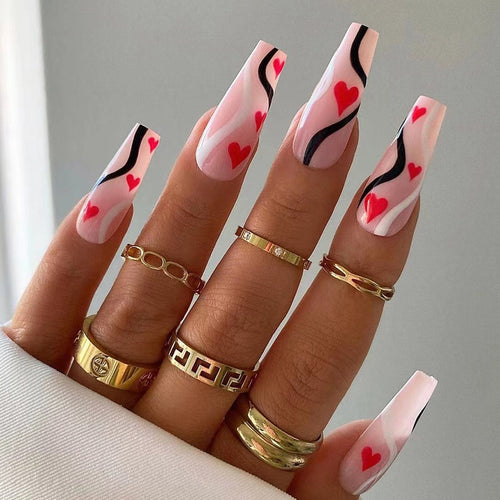 Artificial nail extensions with heart design Bowlift