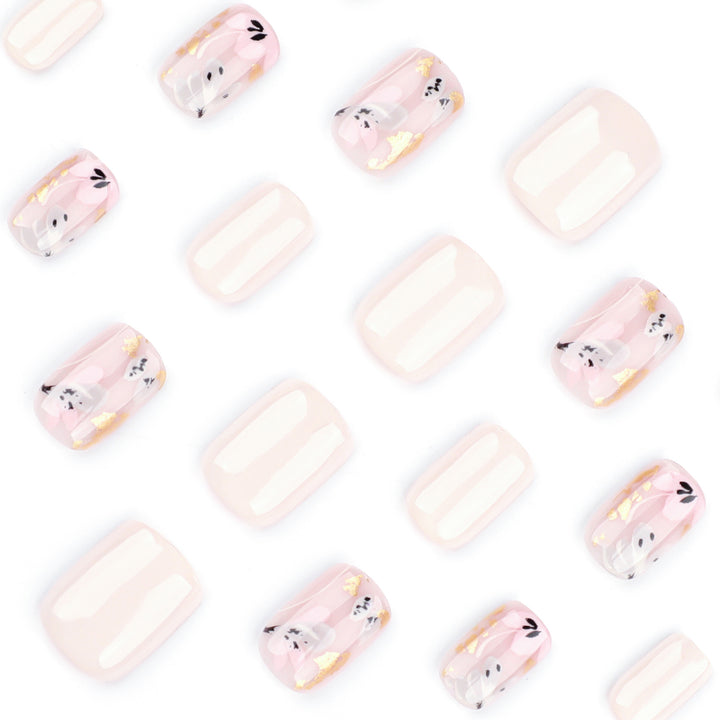 Elegant Artificial Nail Design with Floral Accents Bowlift