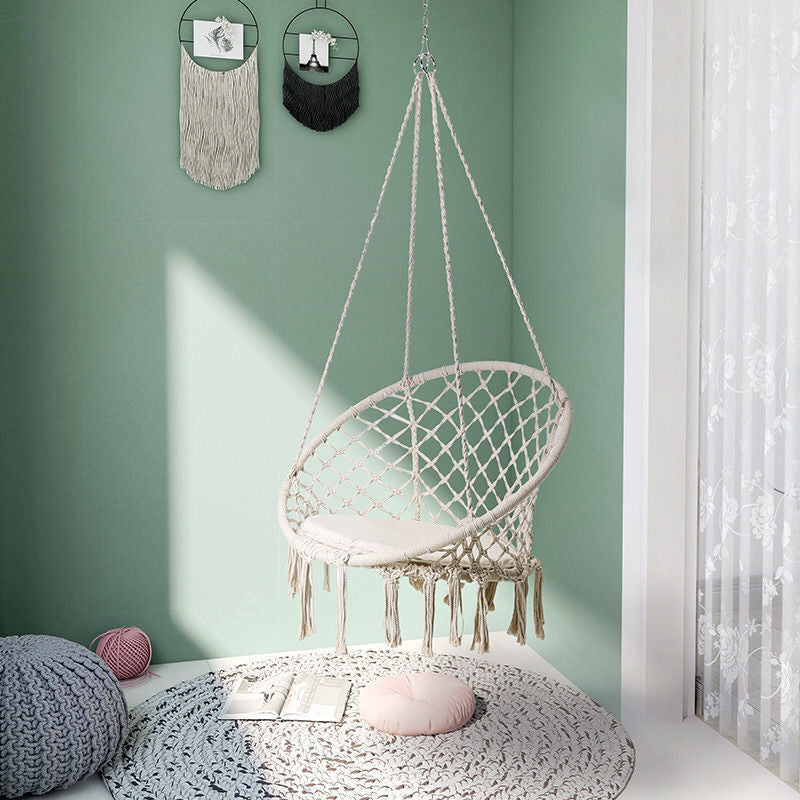 Boho macrame hanging swing chair with faux fur cushion and fringe Bowlift