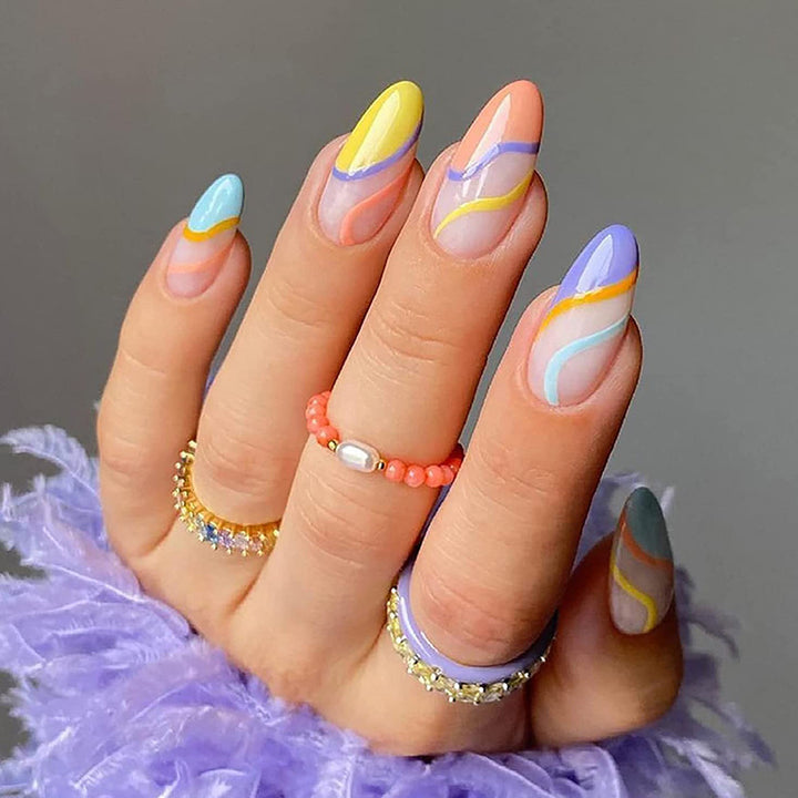 Artificial nail extensions with stylish gradient colors and modern designs Bowlift
