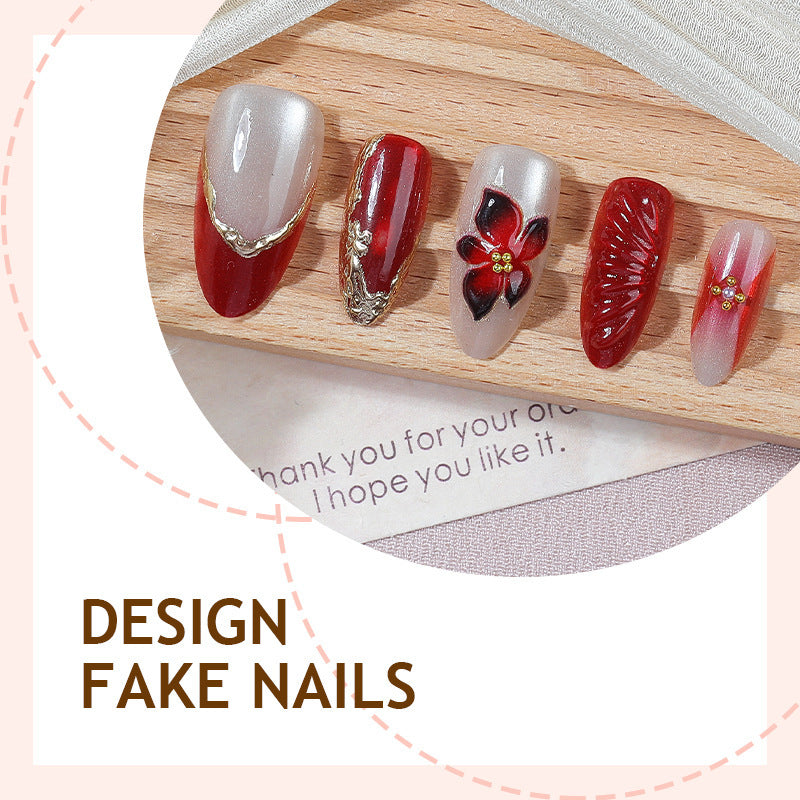 Artificial nail set with elegant floral details and glitter accents Bowlift