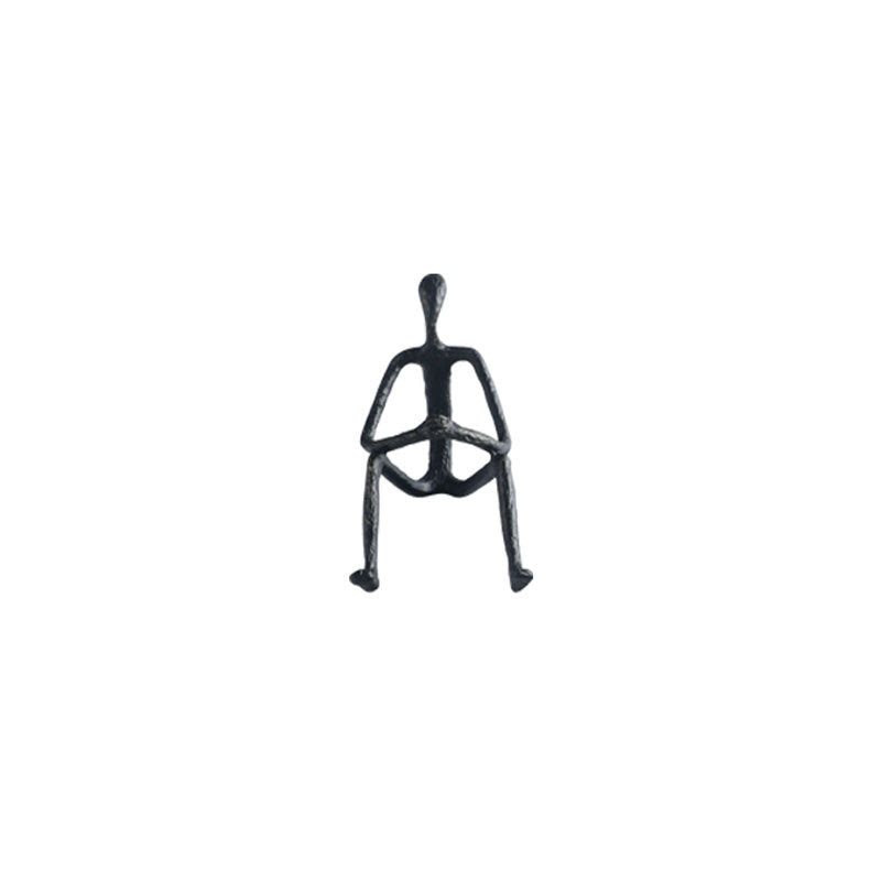 Artistic Sitting Figure Sculpture