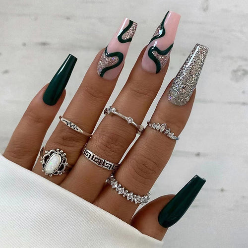 Artificial nail art with elegant glitter and gradient effects Bowlift