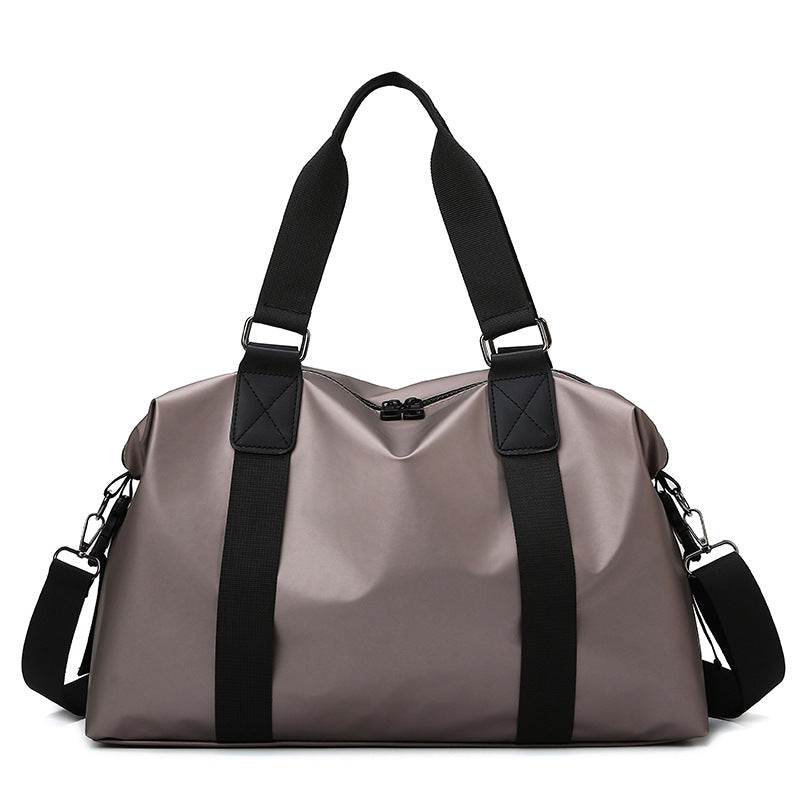 Sporty travel bag with water-repellent properties and ergonomic carrying handles Bowlift