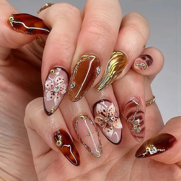Decorative Stiletto Press-On Nail Art with Floral Accents Bowlift