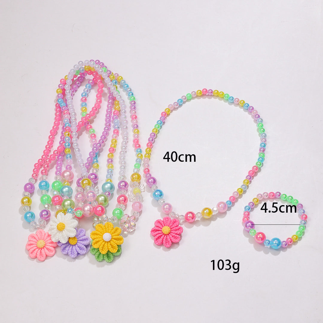 Playful jewelry set with flower pendant Bowlift