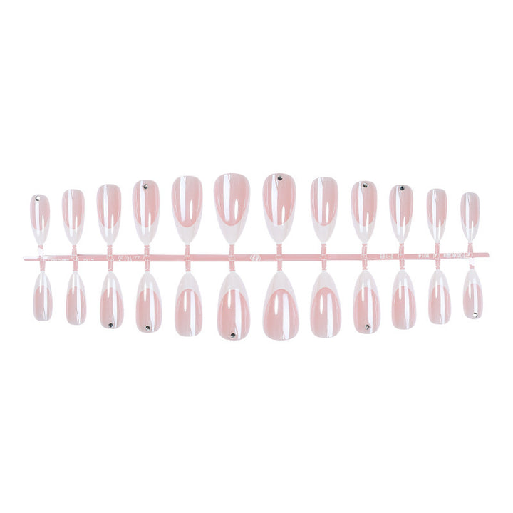 Artificial nail set with elegant French tips and glitter accents Bowlift