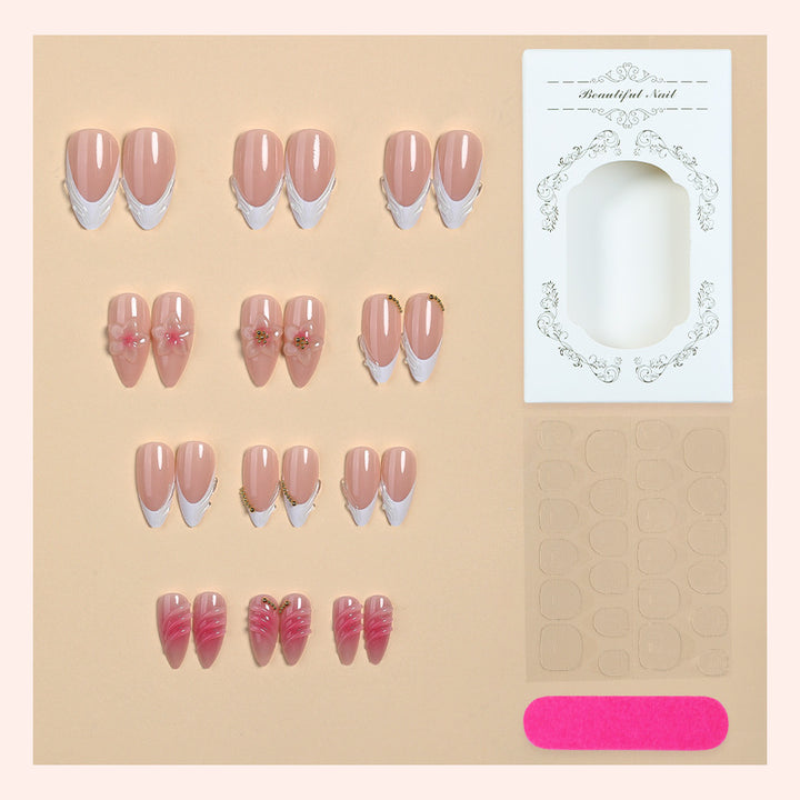 Acrylic nail set with floral design and elegant embellishments Bowlift