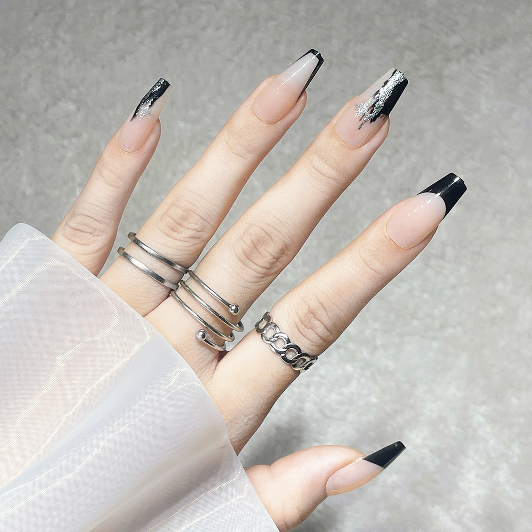 Elegant Stiletto Press-On Nails with Artistic Black Tips and Silver Accents Bowlift